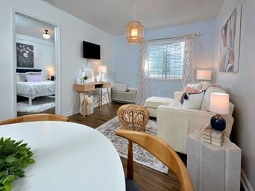 Raleigh apartment for rent - a living room with a white table and a couch