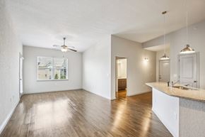 Lebanon apartment for rent - A spacious room with wooden floors and a ceiling fan at Venue at 109 Apartments, Tennessee