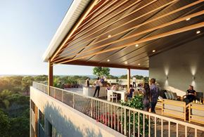 Miami apartment for rent - a group of people sitting on a balcony