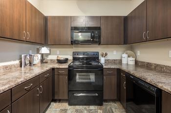 Kitchen with a black stove 
