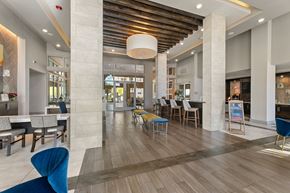 San Antonio apartment for rent - A large open space with a dining area and a bar.