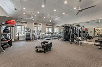 A gym with bench press