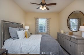 Macon apartment for rent - Bedroom with a Bed at Mill Creek Run Apartments, Macon, GA, 31216
