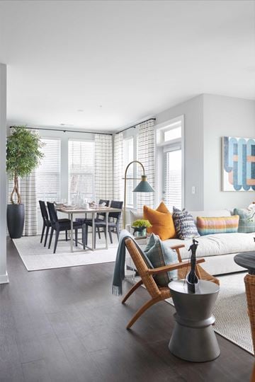 Mableton townhouse for rent - A modern living room with a dining table and chairs.