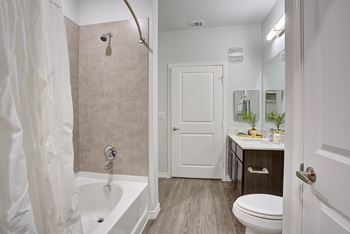 Bathroom with toilet and bathtub
