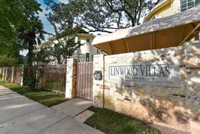 Dallas condo for rent - A sign that says Linwood Villas is on a wall.