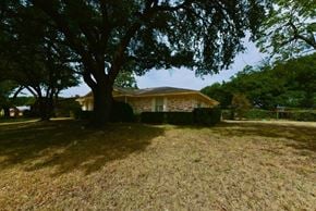 Duncanville apartment for rent - A house with a tree in front of it.
