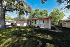Richardson apartment for rent - A house with a tree in front of it.