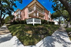 Dallas condo for rent - A building with a sign that says