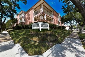 Dallas condo for rent - A building with a sign that says