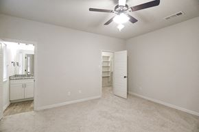 Springtown apartment for rent - an empty bedroom with a ceiling fan and a closet
