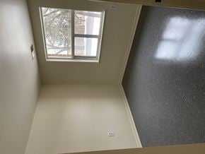 Kingston apartment for rent - A room with a window and a wall.