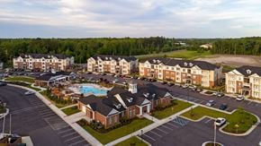Chesapeake apartment for rent - Apartment buildings and parking lot; community clubhouse and pool