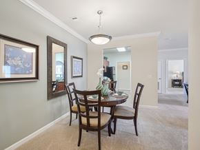 Raleigh apartment for rent - A dining room with a table set for four.