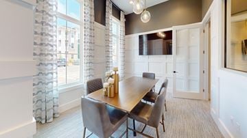 Virginia Beach apartment for rent - A dining room with a table and chairs.