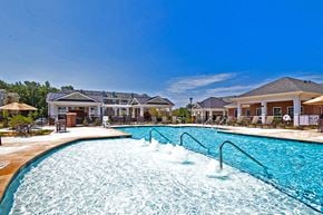 Raleigh apartment for rent - Pool with chairs and umbrellas