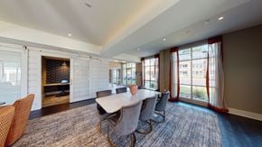 Raleigh apartment for rent - Resident lounge with meeting table and chairs