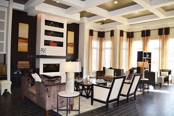 Raleigh apartment for rent - a living room with a couch and chairs and a table