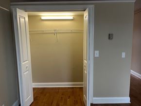 Buffalo apartment for rent - A small white closet with a light on.