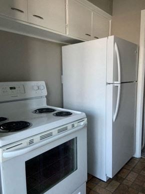 Cleveland apartment for rent - a kitchen with a stove and a refrigerator
