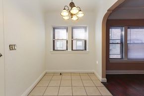 Cleveland Heights apartment for rent - a dining room with a tiled floor and two windows