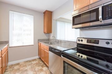 University Heights apartment for rent - a kitchen with stainless steel appliances and a counter top