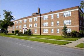 Cleveland apartment for rent - Building with a green lawn in front.