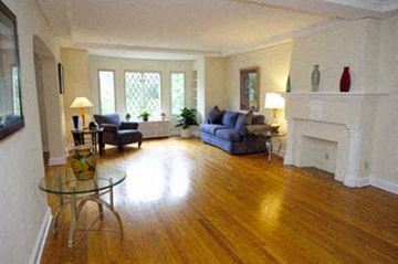 Cleveland apartment for rent - a living room with a fireplace and a table