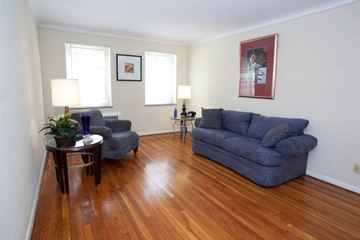 Cleveland apartment for rent - a living room with a couch and two chairs