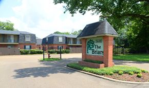 Jackson apartment for rent - The Briars is a residential complex with brick buildings and a gated entrance.