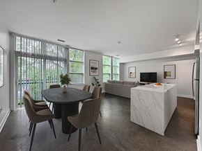 Silver Spring apartment for rent - A modern dining room with a round table and chairs.
