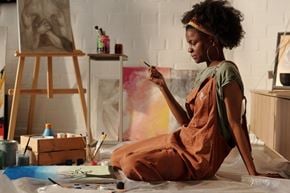 Mount Rainier apartment for rent - A woman artist painting in a studio.