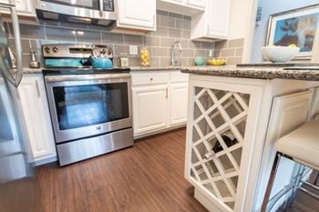 Upscale stainless steel kitchen appliances with double door refrigerator