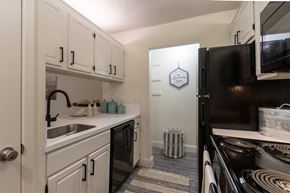 Dallas apartment for rent - This is a photo of the kitchen in a 692 square foot 1 bed, 1 bath model aprtment at Cambridge Court Apartments in Dallas Texas