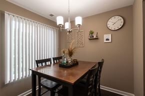 Cincinnati apartment for rent - This is a photo of the dining room in the upgraded 650 square foot, 1 bedroom, 1 bath model apartment at Deer Hill Apartments in Cincinnati, Ohio.