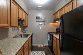Cincinnati apartment for rent - This is a photo of the kitchen in the upgraded 650 square foot, 1 bedroom, 1 bath model apartment at Deer Hill Apartments in Cincinnati, Ohio.