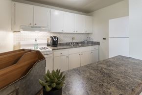 Mt. Healthy apartment for rent - This is a photo of the kitchen of the 1 bedroom, 631 square foot model apartment at Lake of the Woods Apartments in Cincinnati, OH.