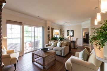 Loveland apartment for rent - a living room with a couch and a table