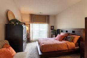 Loveland apartment for rent - This is a photo of the primary bedroom in the 2 bedroom, 2 bath Islander floor plan at Nantucket Apartments in Loveland, OH.