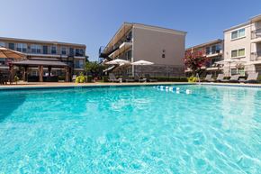 Dallas apartment for rent - This is a photo of the pool area at The Summit at Midtown Apartments in Dallas, TX.