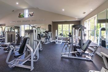 24-Hour fitness center with cardio & yoga/pilates areas
