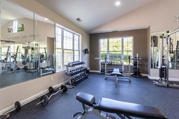 24-Hour fitness center with cardio & yoga/pilates areas