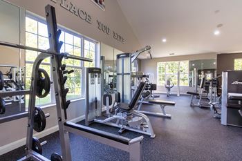 24-Hour fitness center with cardio & yoga/pilates areas