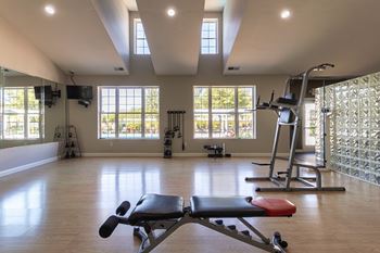 24-Hour fitness center with cardio & yoga/pilates areas