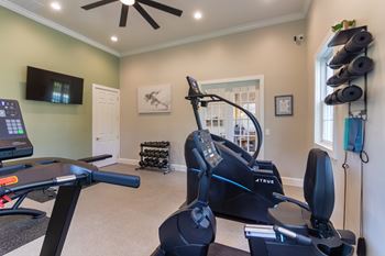 24-Hour fitness center with free weights