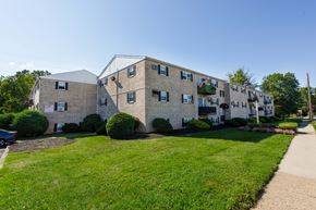 Philadelphia apartment for rent - A building with a green lawn in front at Krewstown Park Apartments, Philadelphia
