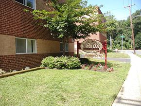 Philadelphia apartment for rent - a brick building with a sign on the side of it