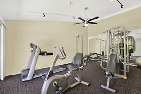 Torrance apartment for rent - a gym with various exercise equipment on the floor at Casa De Oro Apartments, California, 90505