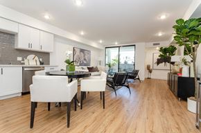 Los Angeles apartment for rent - A modern kitchen with a dining table and chairs.
