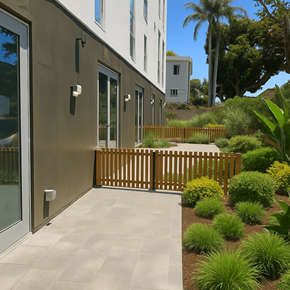 Venice apartment for rent - A modern house with a wooden fence and a garden in front.